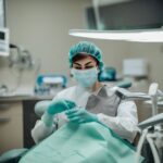 Dentist examining a patient's teeth